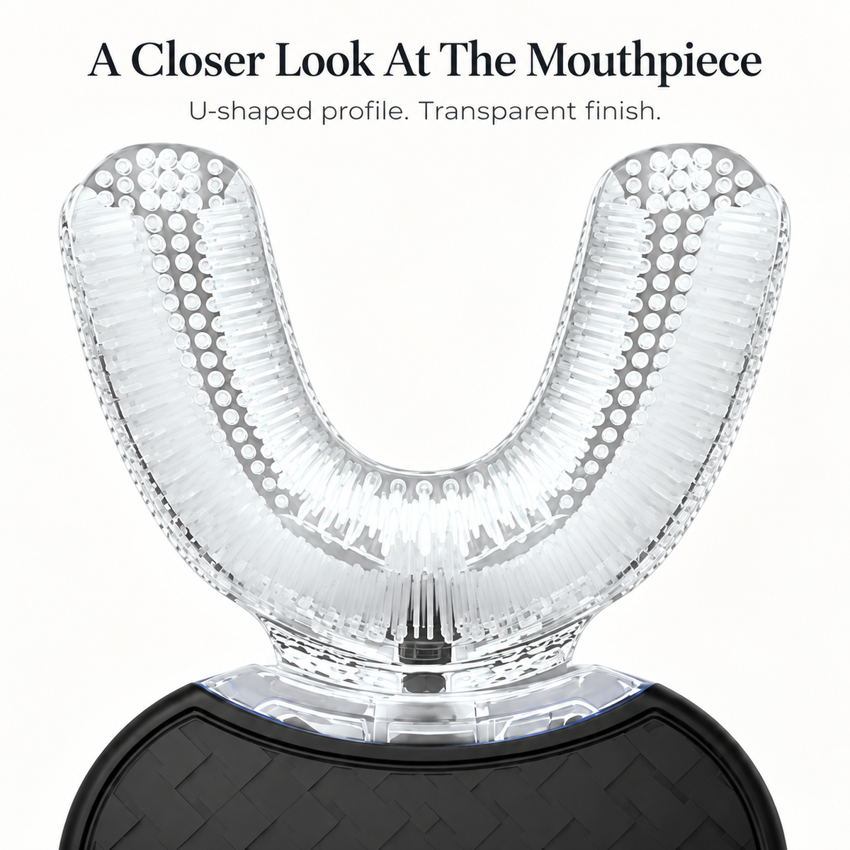 Close-up of the transparent bristled U-shaped mouthpiece