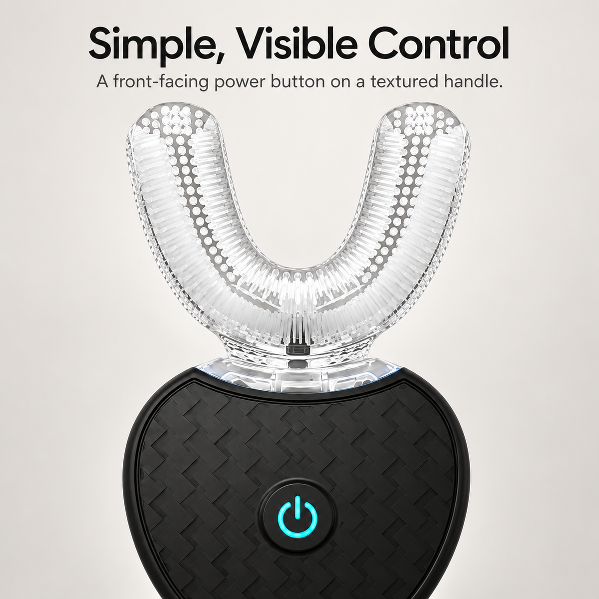 Textured black toothbrush handle with turquoise power button